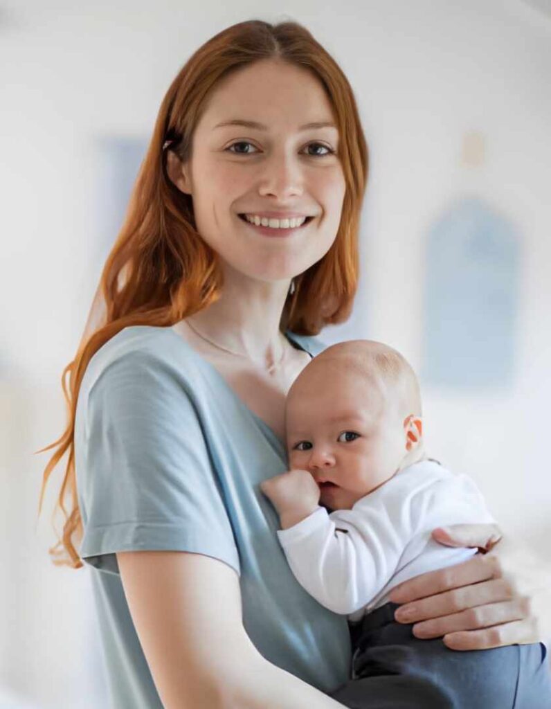 pregnant woman carrying a baby infant pregnant woman carrying a baby infant